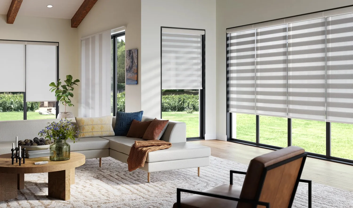 Banded Shades on the windows of a bright living room