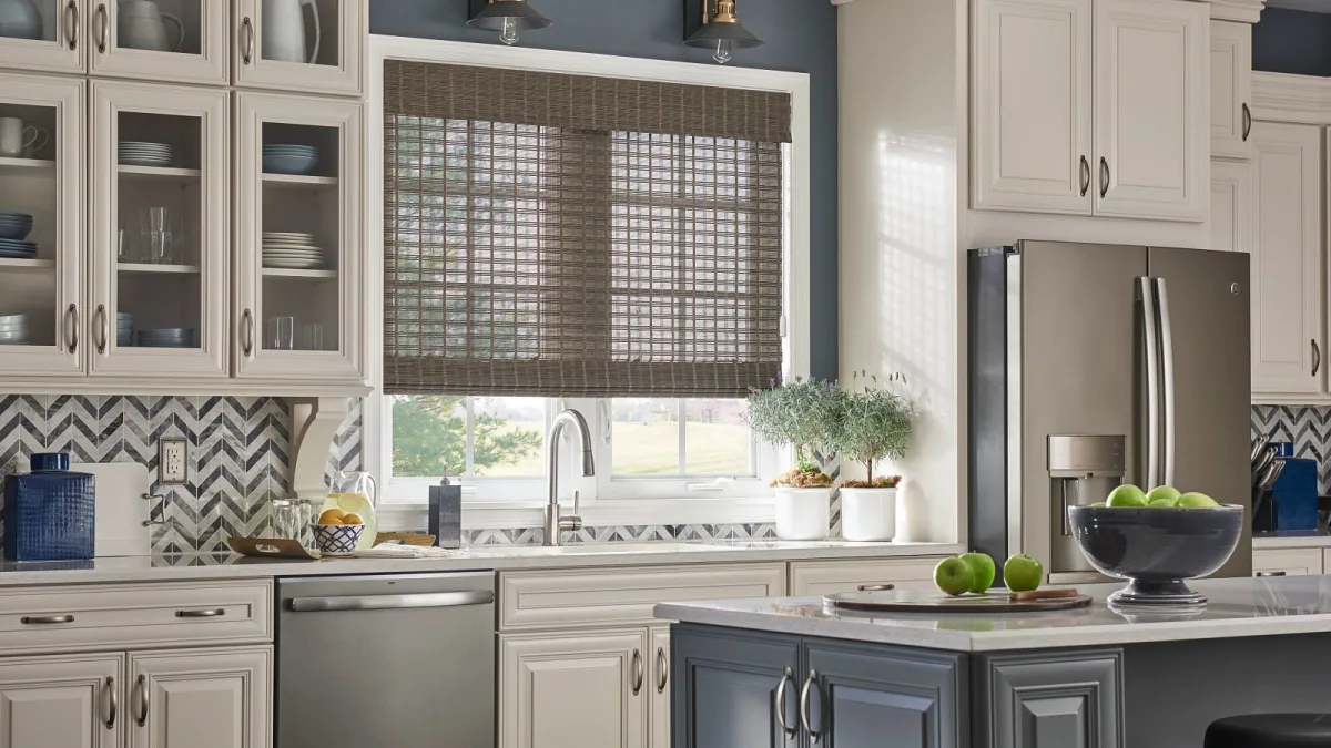 Natural Woven Shade over a kitchen sink window